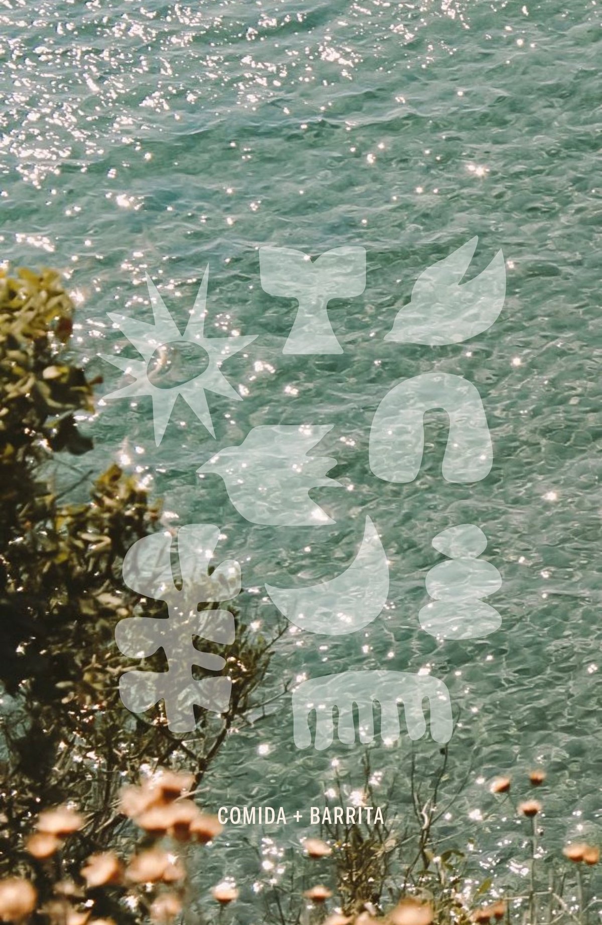 Waterfront poster with white overlaid symbols and text, surrounded by dried flowers against turquoise water with sunlight reflections